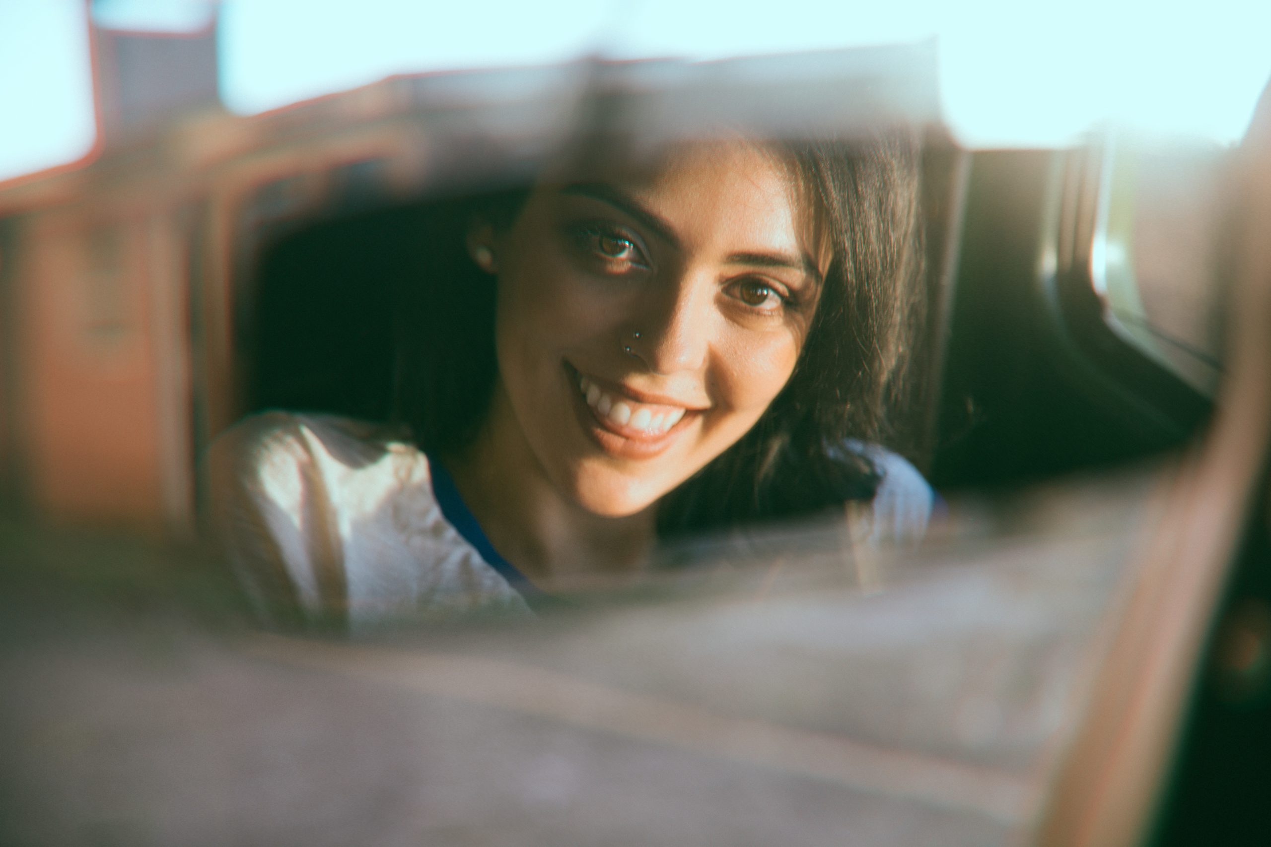 Woman in rearview mirror